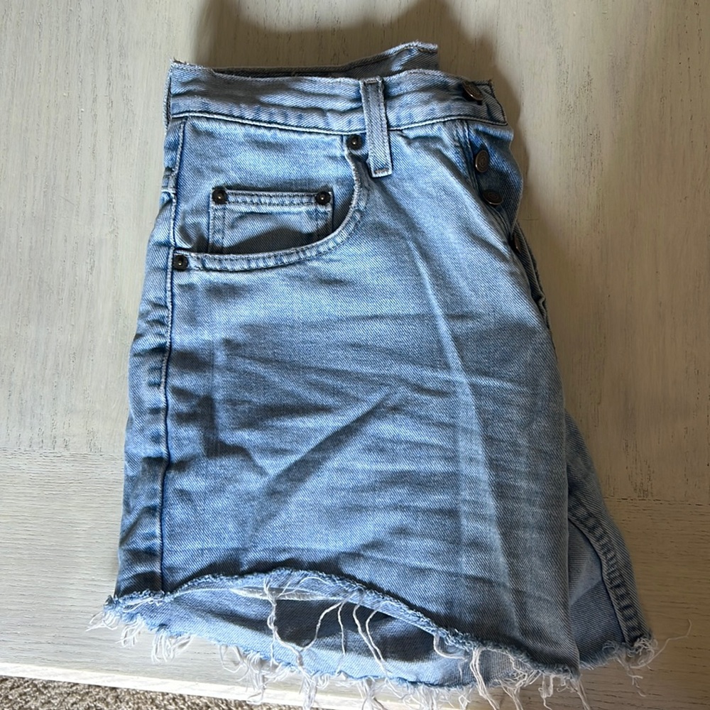 Light Boyfriend style jean shorts with frayed/rolled bottoms